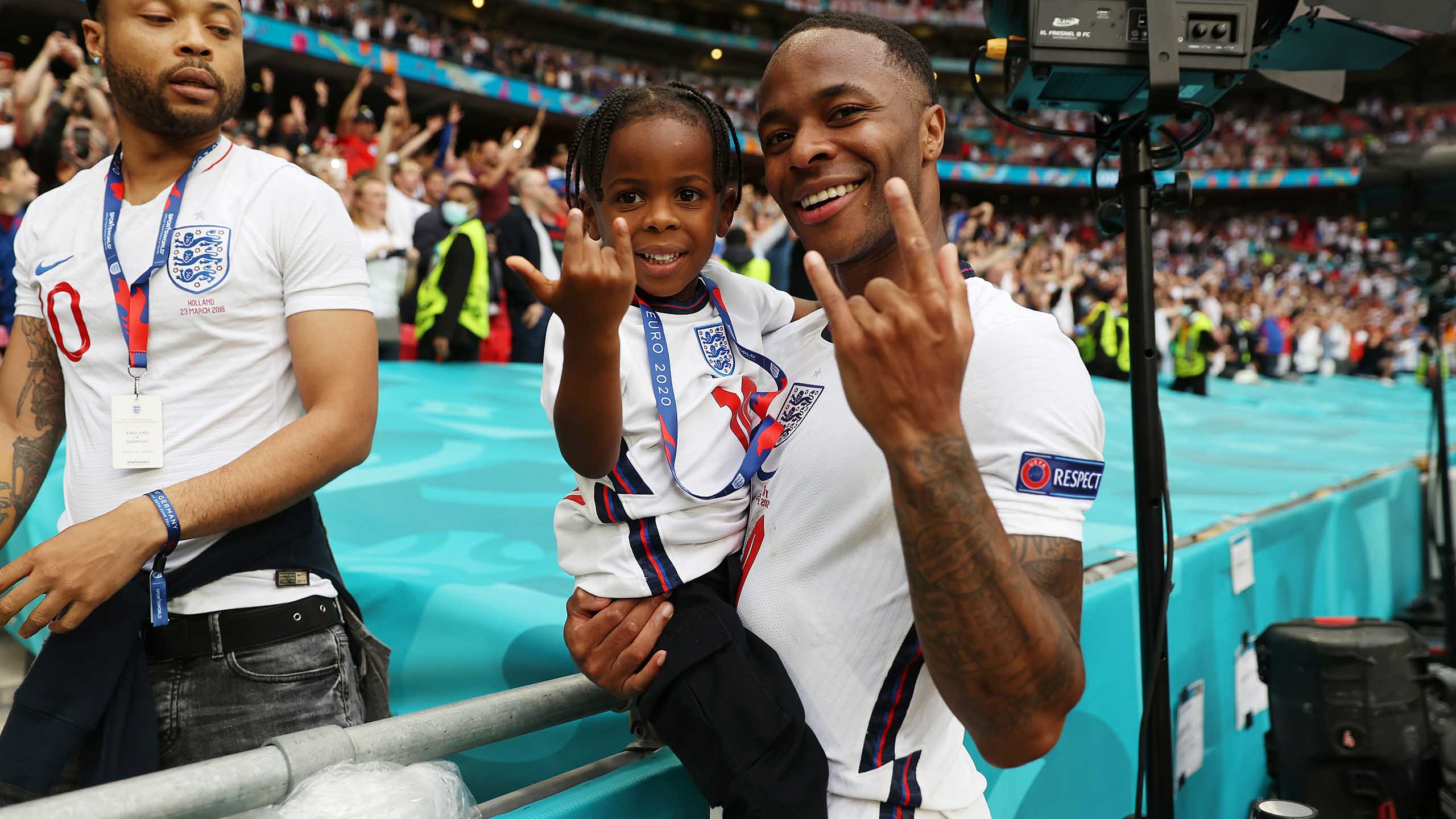 England's Raheem Sterling and his son after the win over Germany at Wembley