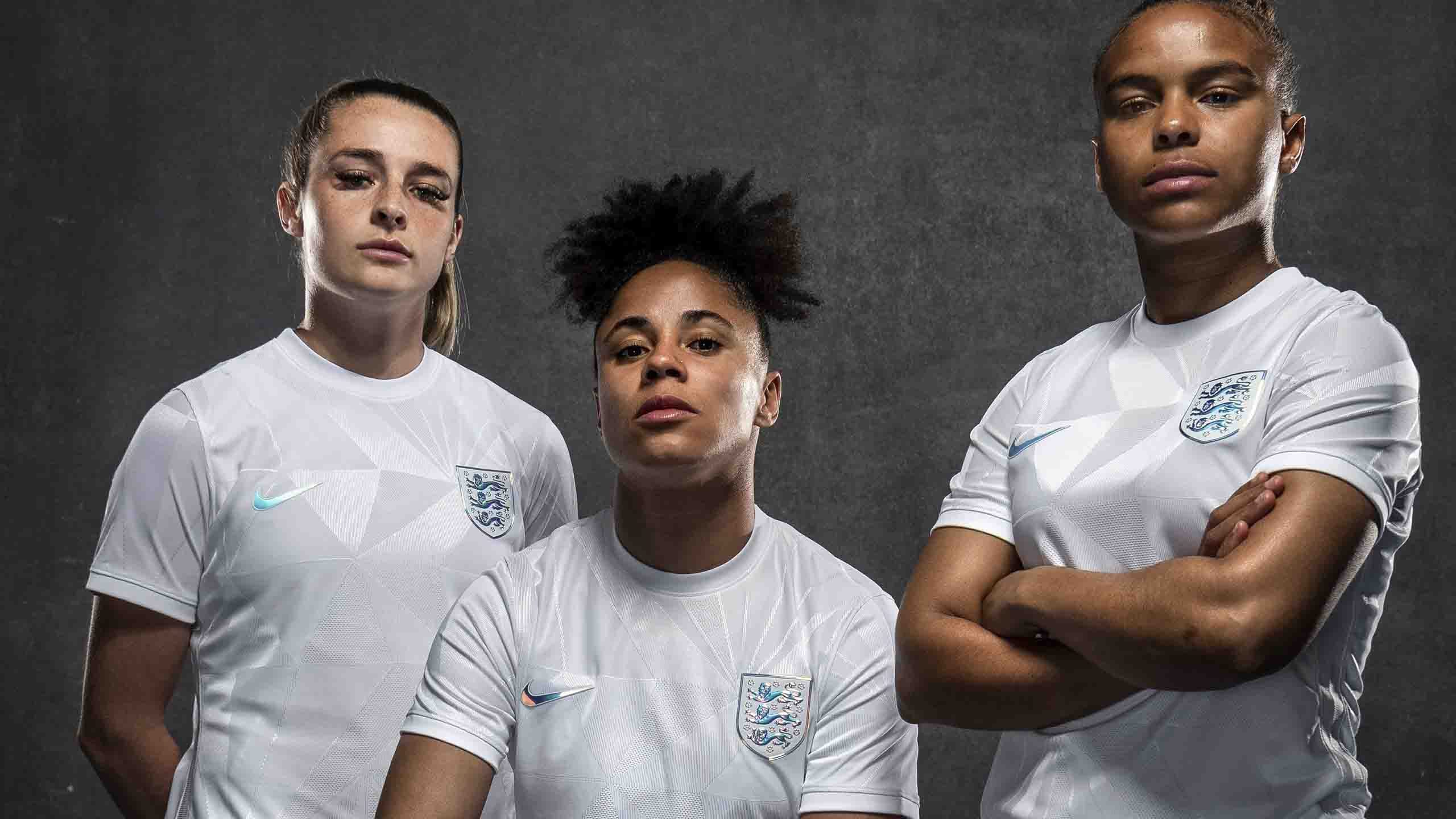 England's Niamh Charles, Demi Stokes and Nikita Parris in the new England Women's kit