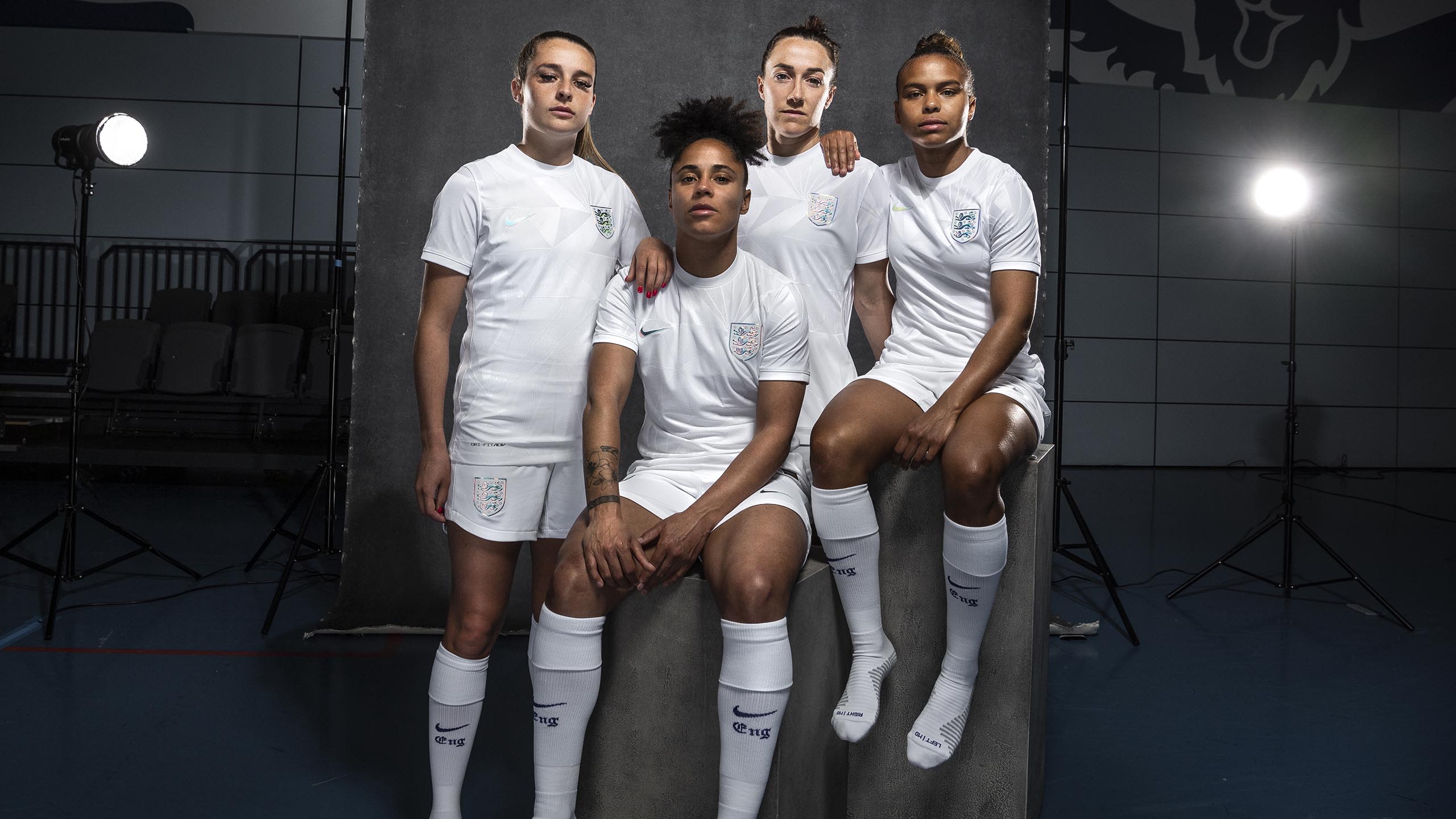 England's Niamh Charles, Demi Stokes, Lucy Bronzer and Nikita Parris model the new England Women's home kit