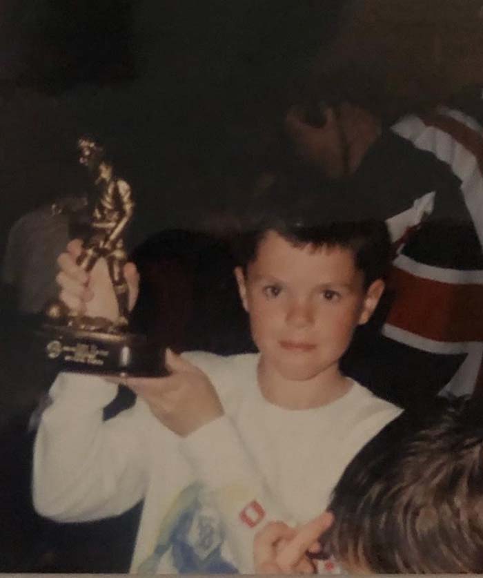 Michael Keane, 9, picks up an award with South Manchester