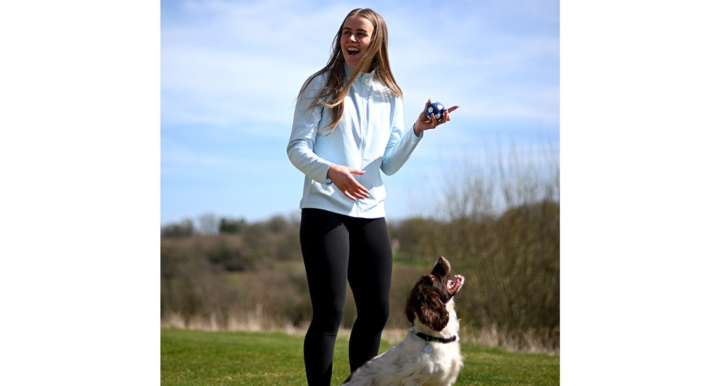 Hannah Hampton with a dog at SGP