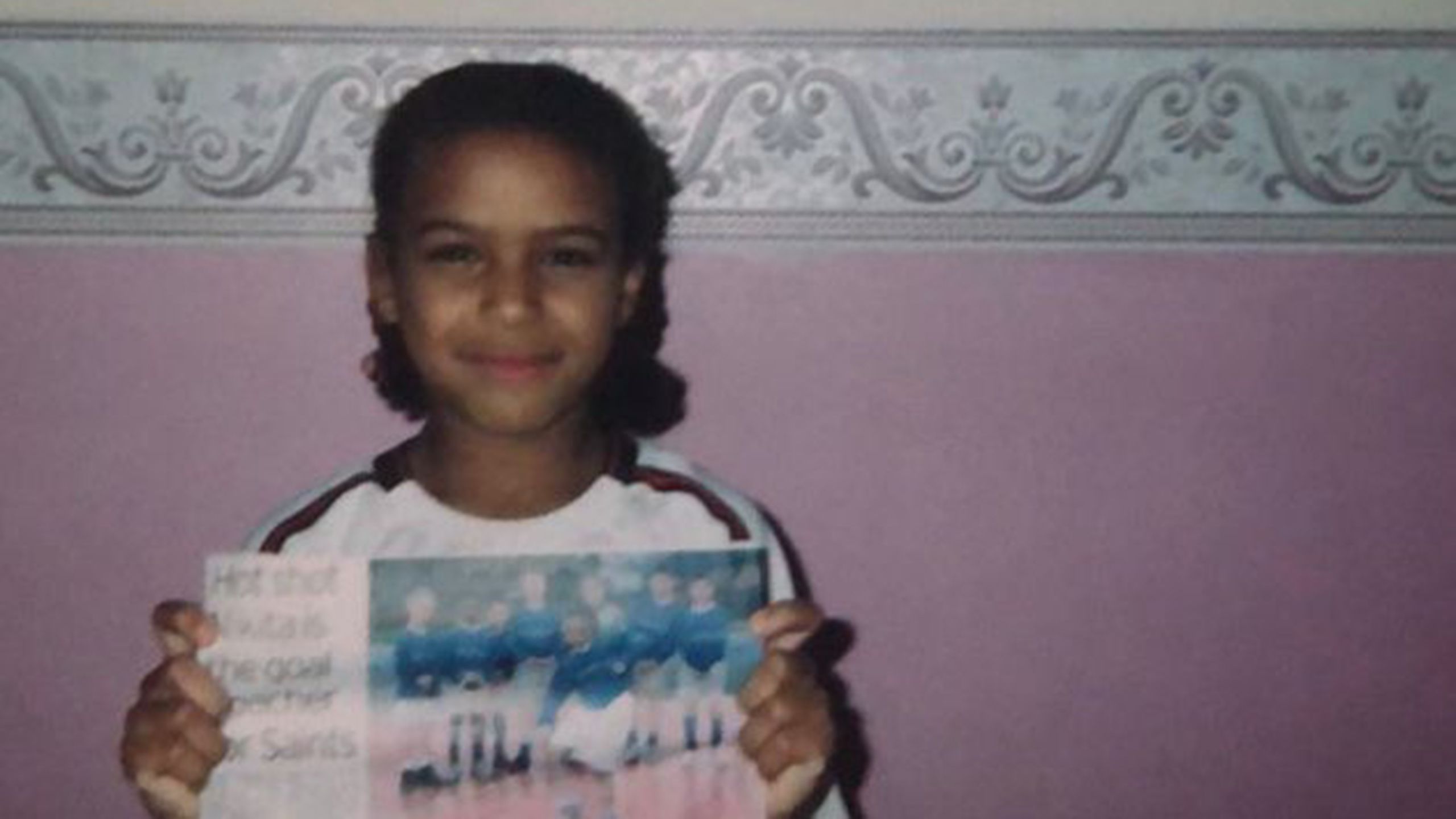 Nikita Parris with a newspaper cutting